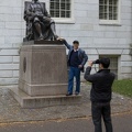 315-0619 Posing with Statue of John Harvard.jpg